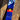 'Sentient' Lanyard by Indigenous Student Hollie Johnson for RMIT University. Lanyard displayed on a log with an up close view of the Aboriginal Flag.